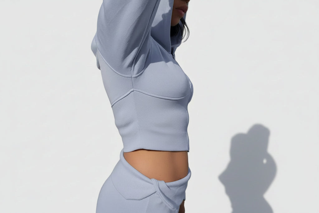 Light Blue athletic outfit on a plain background